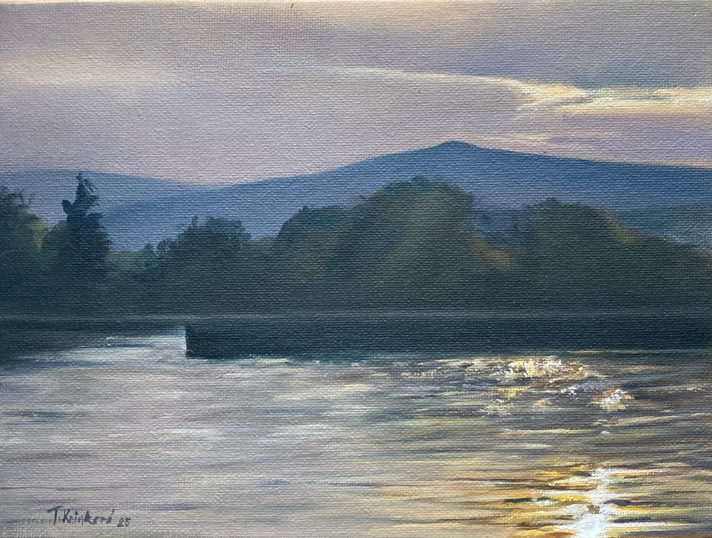 Sunset by water